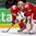 MINSK, BELARUS - MAY 22: Andrei Stepanov #61 and Kevin Lalande #35 of Belarus look on after a 3-2 quarterfinal round loss to Sweden at the 2014 IIHF Ice Hockey World Championship. (Photo by Andre Ringuette/HHOF-IIHF Images)